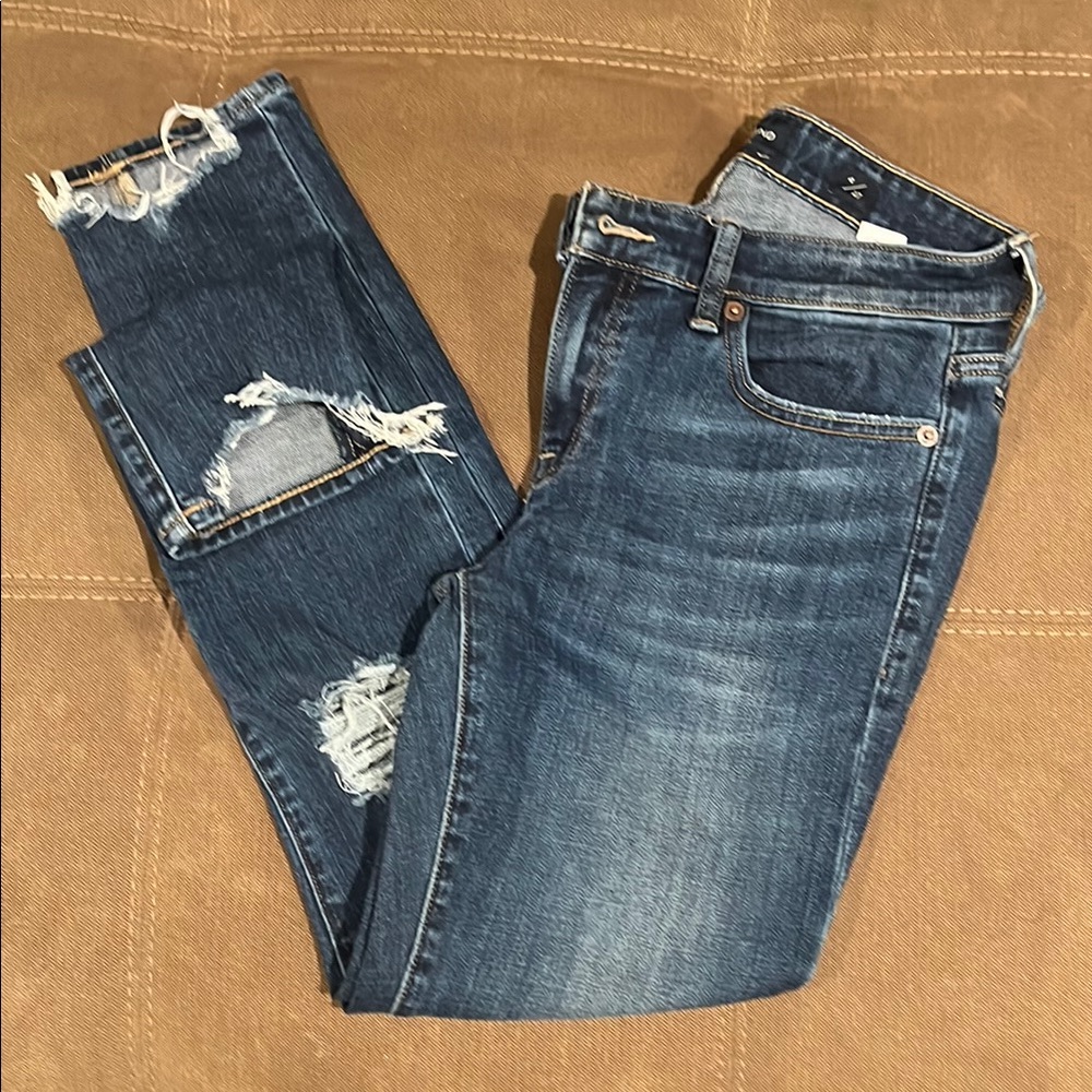 Distressed Blue Denim Jeans